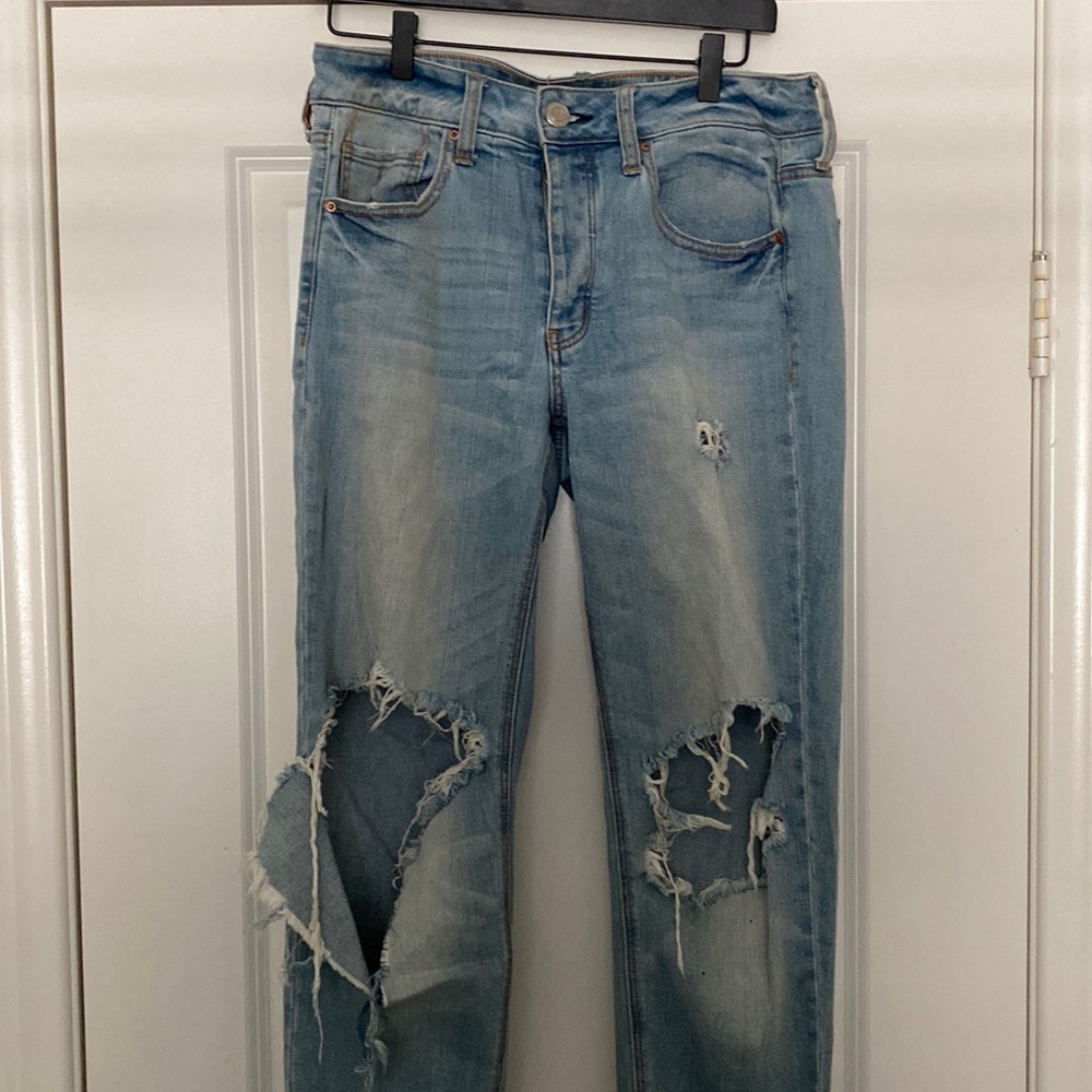 Light wash jeans with holes